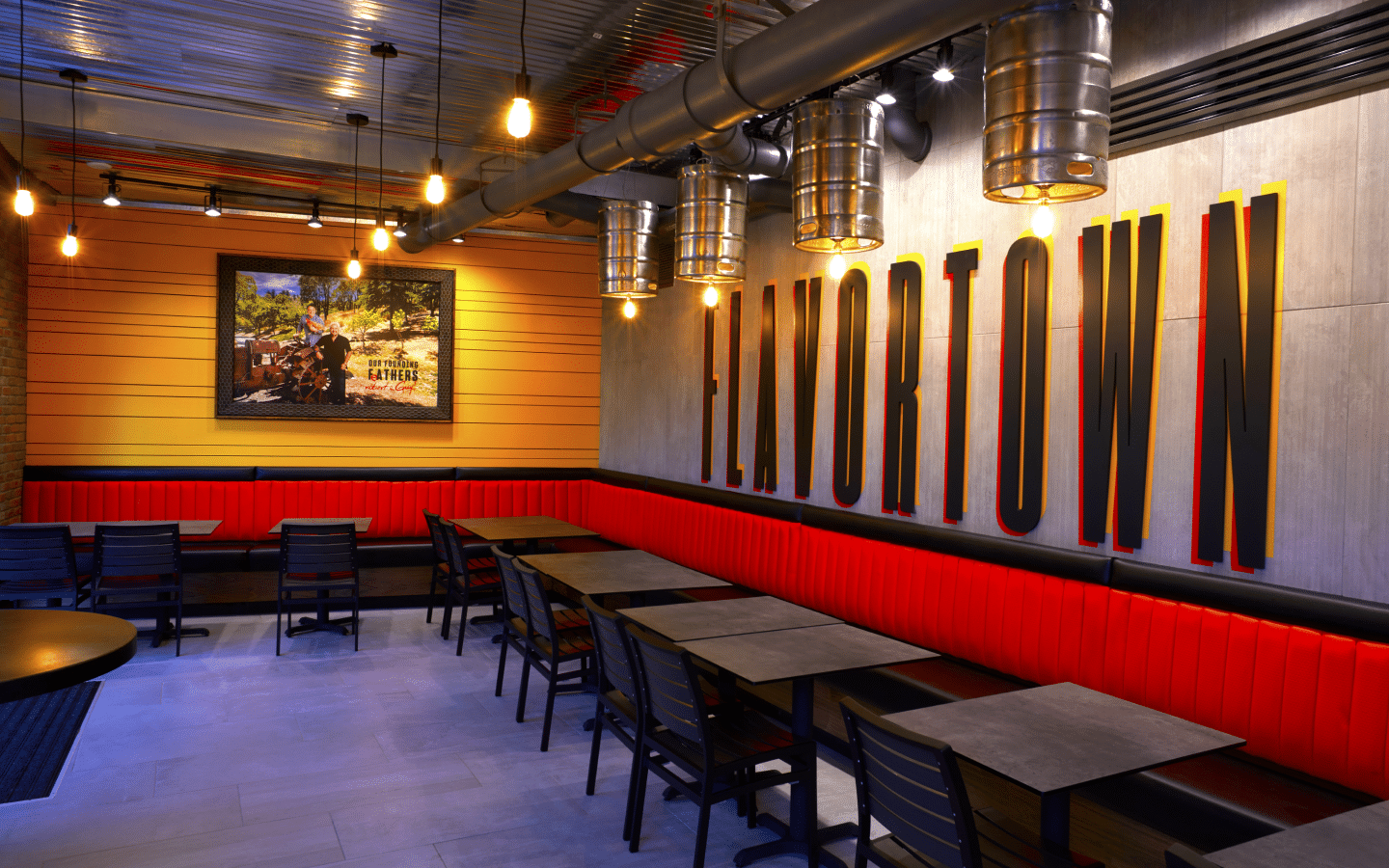 Chicken Guy! interior with a 'FLAVORTOWN' sign