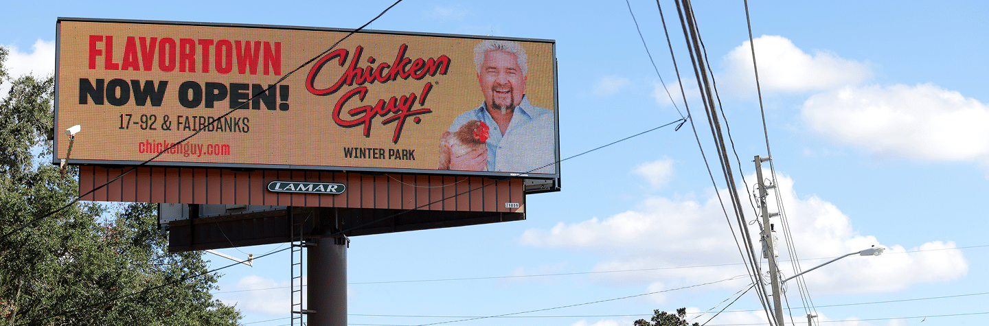 Billboard that says Now Open